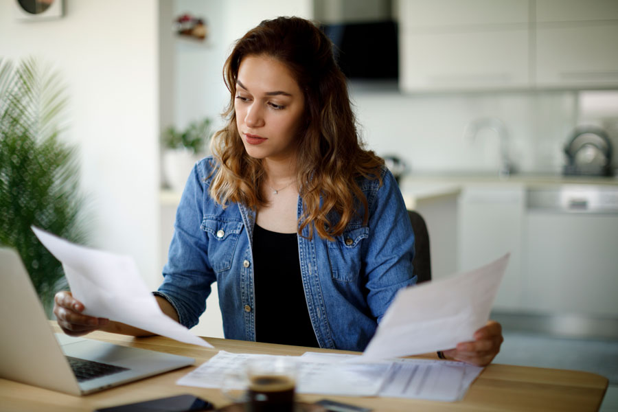 young woman looking at fryer law firm estate plan documents