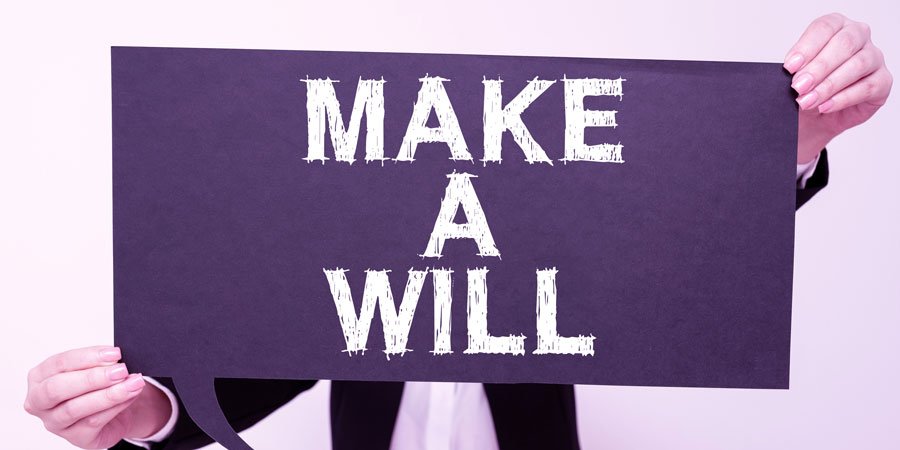 Sign displaying Make A Will with estate planning lawyers in McAllen